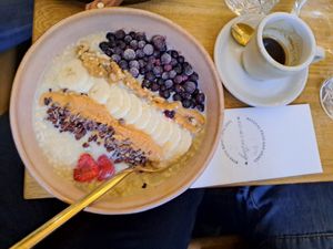 Vegan porridge and espresso at Zina's Eatery in Vienna