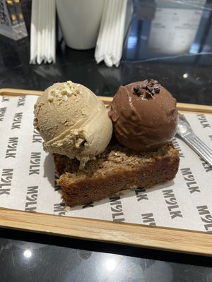 Banana bread with salted cashew and dark choc ice cream   at MYLK in Doha