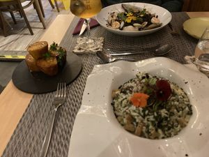 Vegan risotto and sweet potato side. Non vegan option at the back.  at Gavino Restaurante Bar in Funchal
