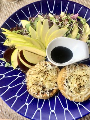 Veggie burgers, vegan cheese, salad at Gavino Restaurante Bar in Funchal