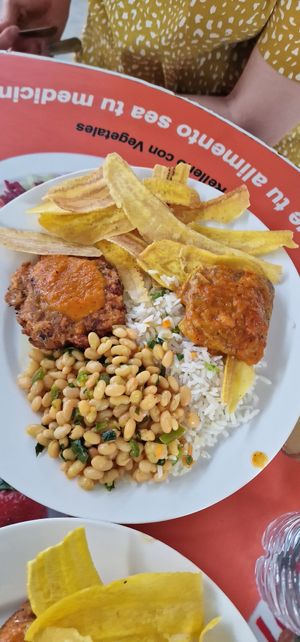 Rice , beans, banana chips, patty and something at Ananda in Managua