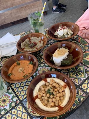 Muhammara, Hummus, Falafel with Tahina, Moses Salad with Tahina, Baba Ghanouj, home-made lemonade  at Moses Cafe in Graz