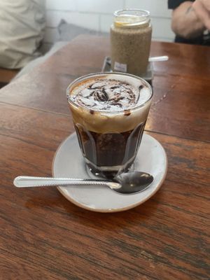 Coconut condensed milk and chia pudding (background)   at Backyard Cafe - Street 240 in Phnom Penh