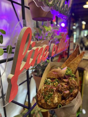 Hail kale with green tomato  at Dharma Southern Kitchen in Sanford