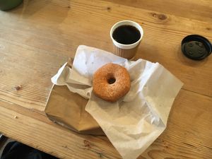 Cinnamon-sugar donut + coffee at Dough Doughnuts - Flatiron in New York City