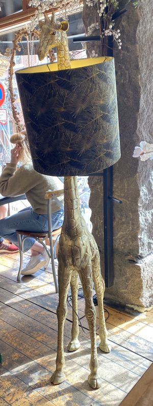 genuinely love this giraf lamp its so friend  at Penny Lane Cafe in Aalborg
