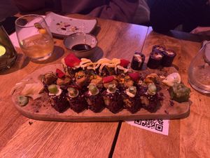 Our board of different sushi options already half smashed   at Vegan Sushi Bar - Downtown in Amsterdam