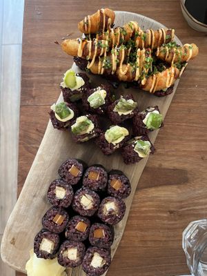 Shrimpless tempura (top), mushroom roll (middle), tofu & salmon maki (bottom)  at Vegan Sushi Bar - Downtown in Amsterdam