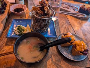 Miso soup, tofu maki with "salmon", fried mushroom wings at Vegan Sushi Bar - Downtown in Amsterdam