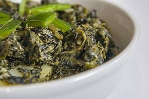 Gomen w/ Dinich - Seasoned spinach with potatoes at Konjo Ethiopian Food in Edgewater