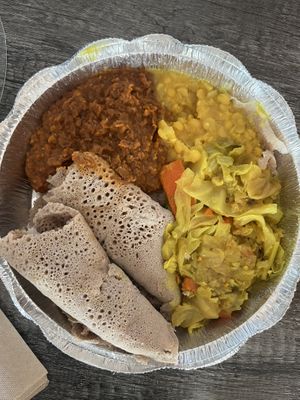 Vegan plate: Misir Wot (spiced red lentils), Kik Alicha (yellow split peas), and Tikel Gomen (curried cabbage)  at Konjo Ethiopian Food in Edgewater