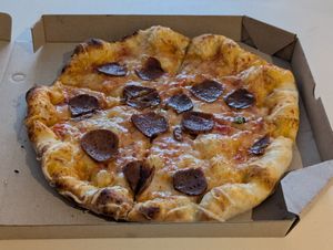 Yummy pepperoni pizza at Herbívoro- Chapinero in Bogota