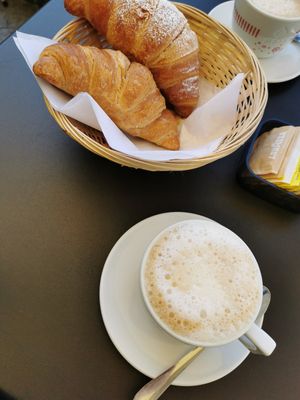 Vegan croissant and cappuccino at Comis Ice Cafe in Catania