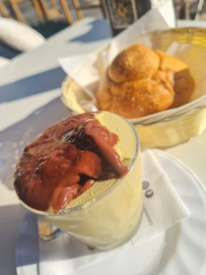 Modica chocolate and pistacho granita (naturally vegan) with vegan brioscia at Comis Ice Cafe in Catania
