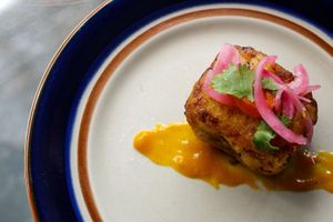 Papa Rellana 

Peruvian influenced stuffed potatoes with mushroom walnut beef crumble, raisins and garlic. Topped with salsa criolla & aji amerillo salsa at TUME in Orlando