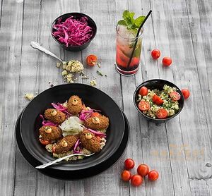 Falafel, coleslaw & couscous at Harvest Kitchen & Bar in Quarteira