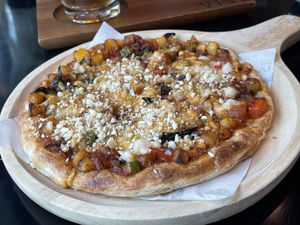 Vegan mixed veggie pizza, 195 baht  at VIBE Coffee & Plant-Based Food in Bangkok