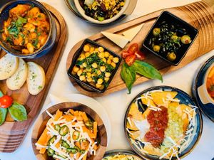 Part of our menu: tasty aubergines, tapas, garbanzos, paella plantas, tofoctopoz, and much more! at The Vegan Brasserie in South West London