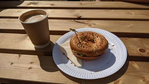 Salted caramel latte (with oat milk) and BLT bagel at Be Kind The Vegan Coffee Caravan in Hayle