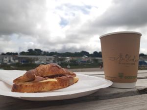 Pumpkin spiced latte and 'ham' & cheeze filled croissant - perfect Sunday brunch! at Be Kind The Vegan Coffee Caravan in Hayle