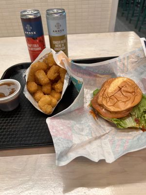 Buffalo chicken sandwich with tater tots  at V Burger in Calgary