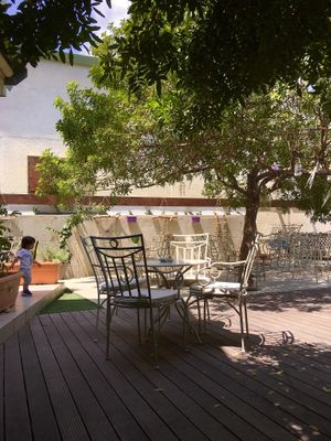 Outdoor places in inner yard with a garden at Let Them Eat Cake in Paphos
