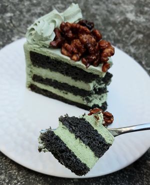 Mugwort & black sesame cake with caramelized walnuts - close-up at Cafe Turtle 카페 거북이 in Seoul