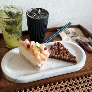 Two pieces of cake, lemonade and iced americano at Cafe Turtle 카페 거북이 in Seoul