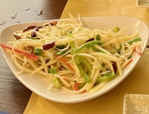 Shredded stir-fried potatoes with vinegar, garlic and chilli. Simple but delicious.  at Su Guan in Florence