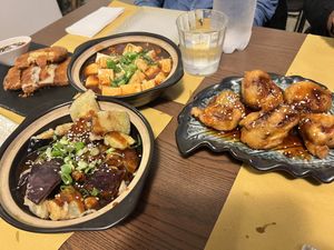 Forgotten the exact titles, but these are fried tofu and mushroom balls, bean bean curd, and aubergine in black bean sauce.  at Su Guan in Florence