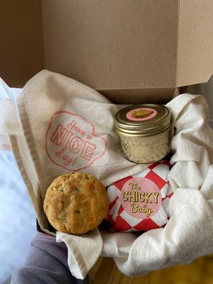 Comes with a towel wrapped around the biscuits to keep them warm! at NICE Biscuit in Syracuse