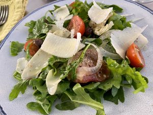Arugula salad with shaved Parmesan  at Perle Restaurant in Pasadena