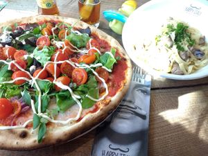 Our pizza and pasta funghi. at Happy Italy in Eindhoven