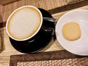 Latte and sugar cookie at The Vegano Bistro in Chiang Mai