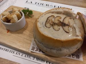 Truggle mushroom soup served inside a bread roll at The Vegano Bistro in Chiang Mai
