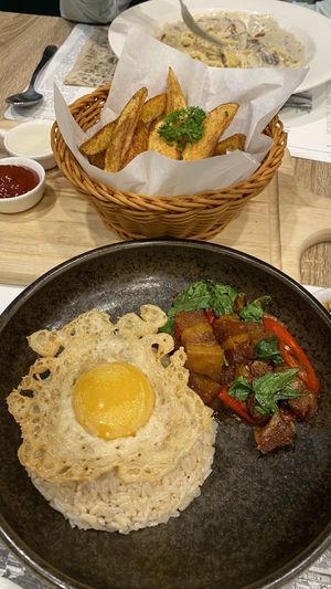 Crispy pork in basil with vegan egg  at The Vegano Bistro in Chiang Mai