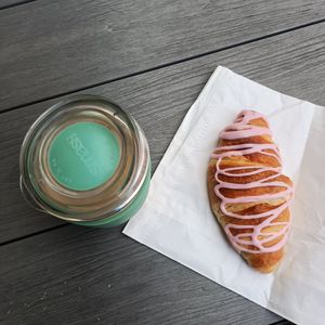 Almond latte and vegan strawberry croissant at The Basin Bakery in The Basin