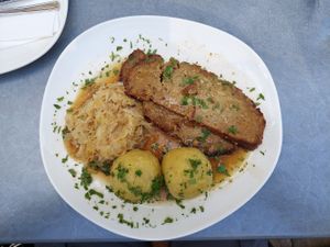 Caraway roast with sweet sauerkraut and potato dumplings at Velani in Vienna