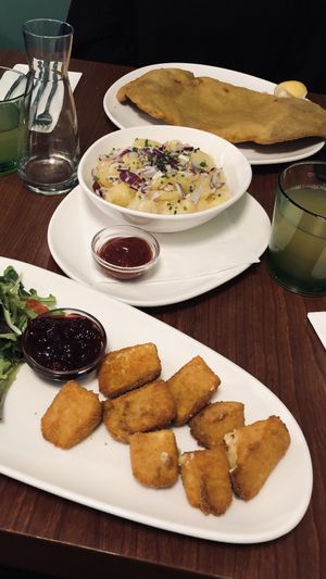 Schnitzel mit Kartoffelsalat und gebackener Käse  at Velani in Vienna