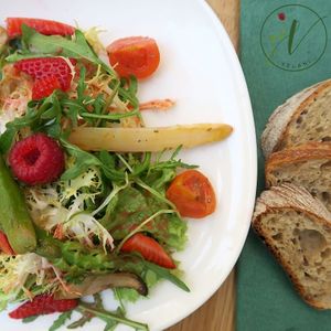 Asparagus salad with strawberries and grilled mushrooms with fruity raspberry vinaigrette. at Velani in Vienna