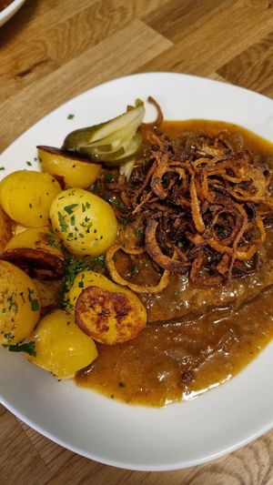 Zwiebelrostbraten - heavy (Austrian food lol), but soo good. at Velani in Vienna