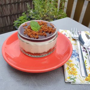 Cheesecake in a glass with fruit glaze.  at Velani in Vienna