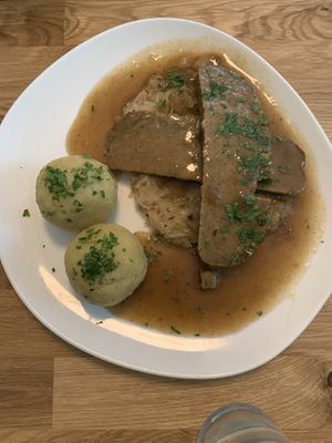 Caraway roast with sweet sauerkraut and potato dumplings  at Velani in Vienna
