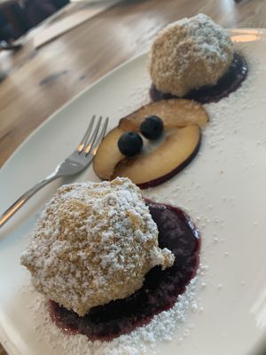 Nougat dumplings with berry coulis  at Velani in Vienna