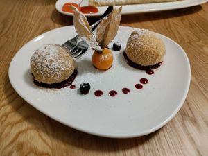 Sweet dumplings filled with nougat at Velani in Vienna