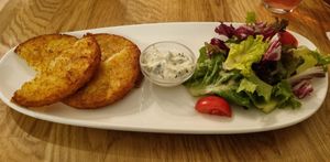 Viennese potato pancakes with herb butter and salad (8,80€) at Velani in Vienna