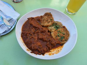 Wiener Saftgulasch mit Serviettenknödel at Velani in Vienna
