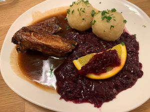 “Vegansl” - vegan goose with red cabbage and potato dumplings (amazing texture and taste!)  at Velani in Vienna