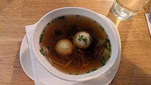 Grießnockerlsuppe/ vegetable broth with semolina dumplings  at Velani in Vienna
