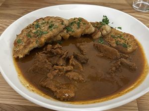 Wiener Saftgulasch mit Serviettenknödel  at Velani in Vienna